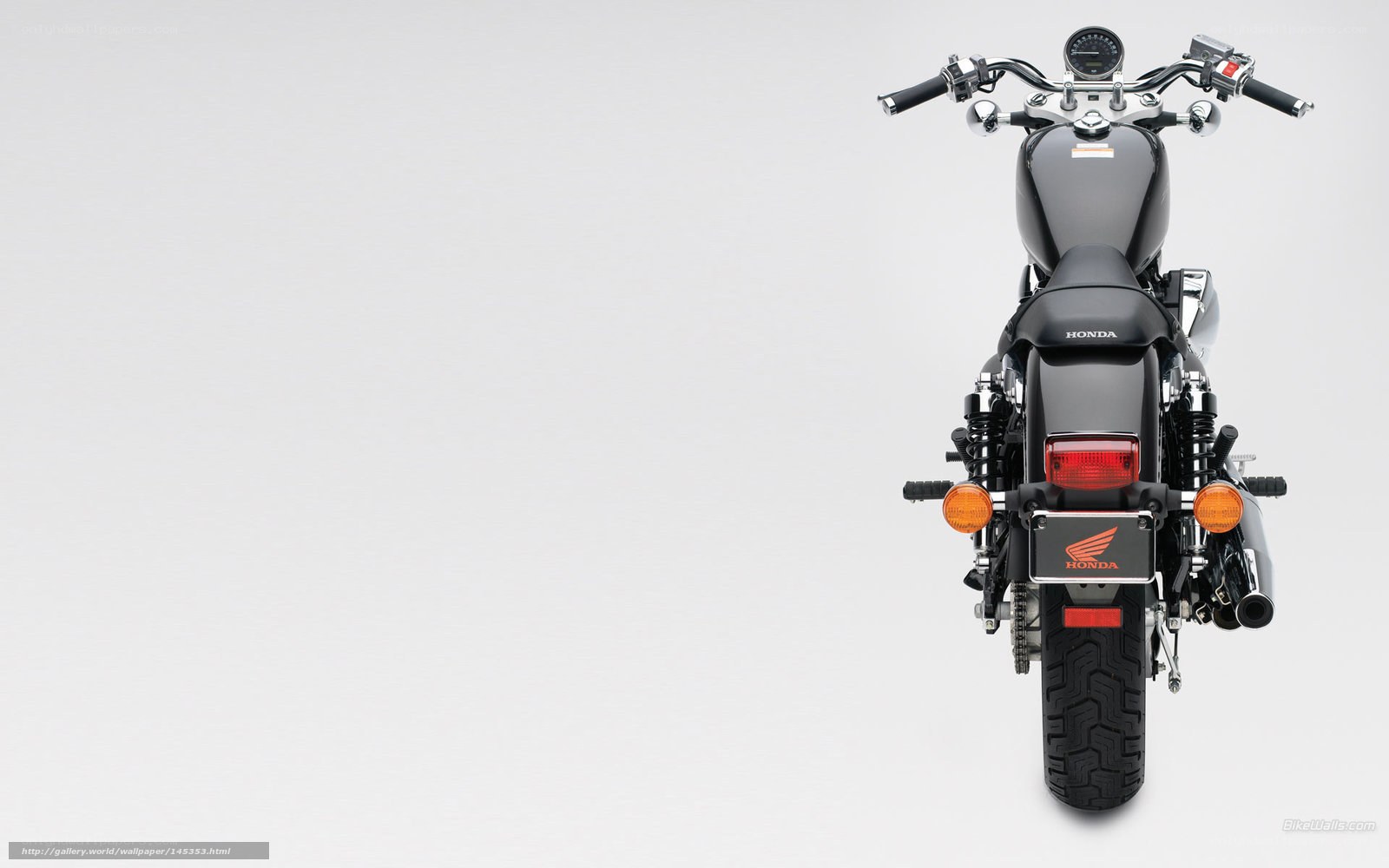 black honda motorcycle rear view