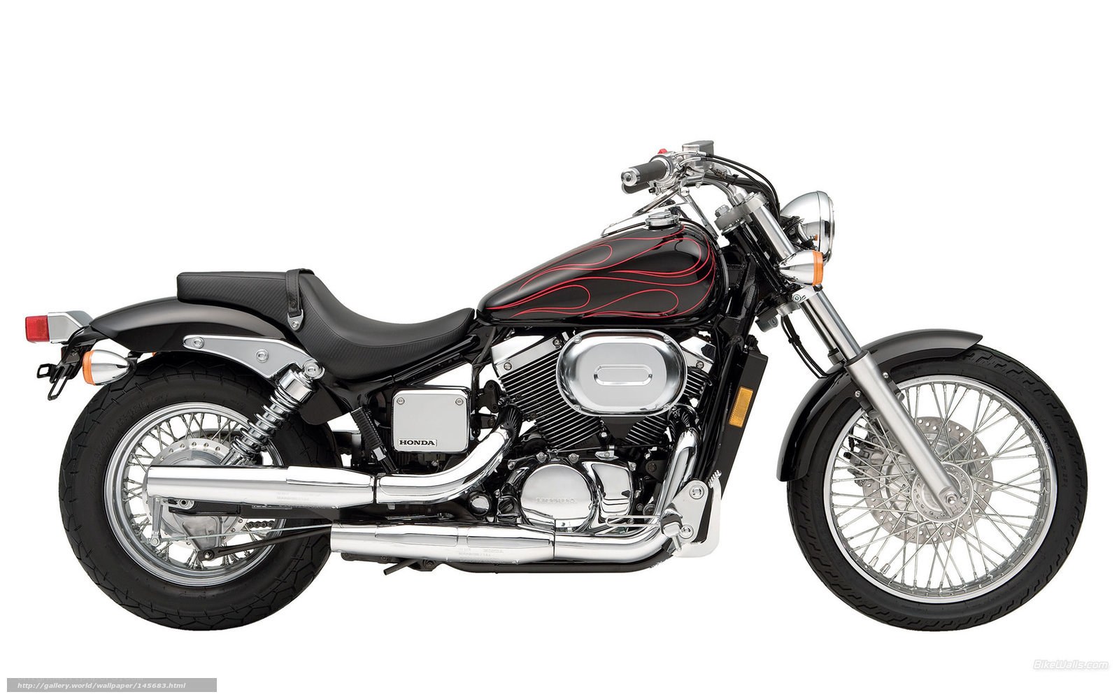 Black Honda motorcycle with red flames