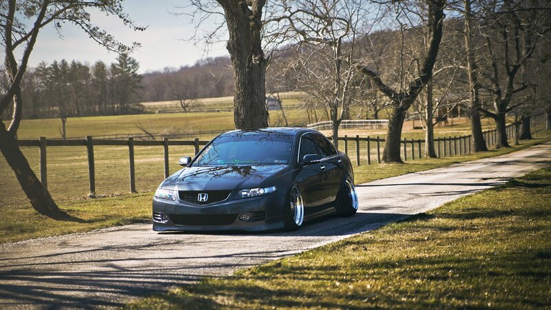 black honda on a country road