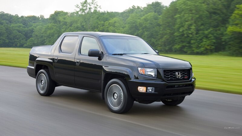 black honda ridgeline in motion