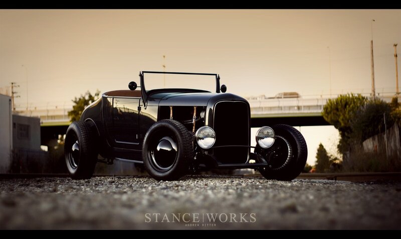 Black Hot Rod Car — Dramatic, Sunset, Photograph, Gravel Ground