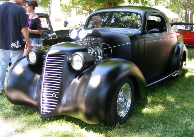 Black hot rod car on display