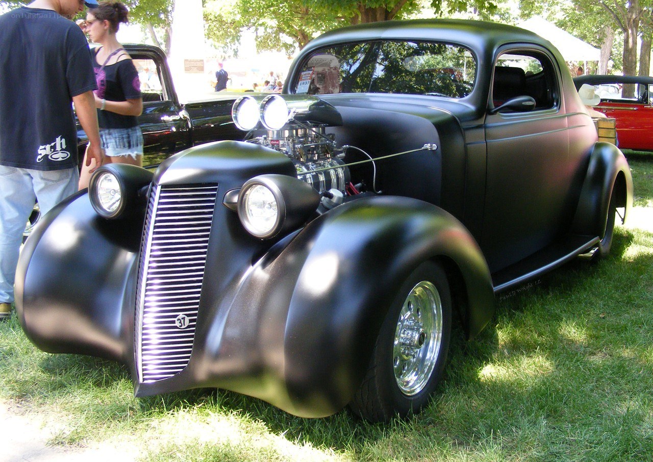 Black hot rod car on display