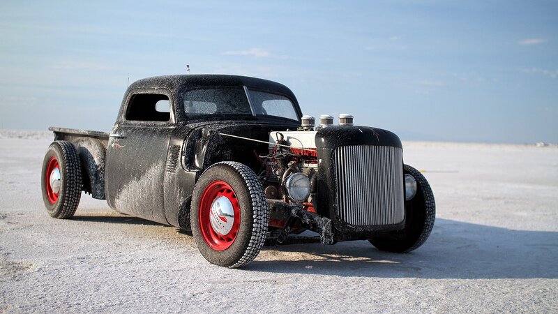 black hot rod truck on salt flat