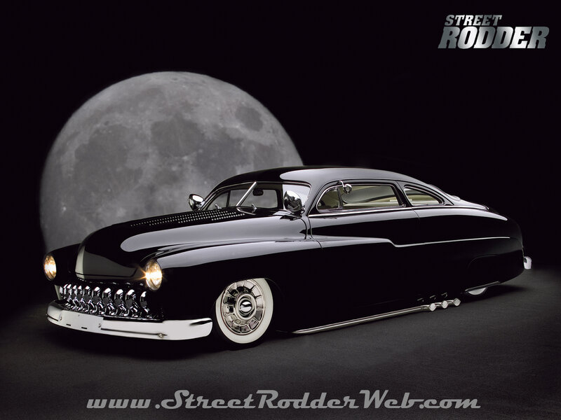 Black hot rod with moon backdrop