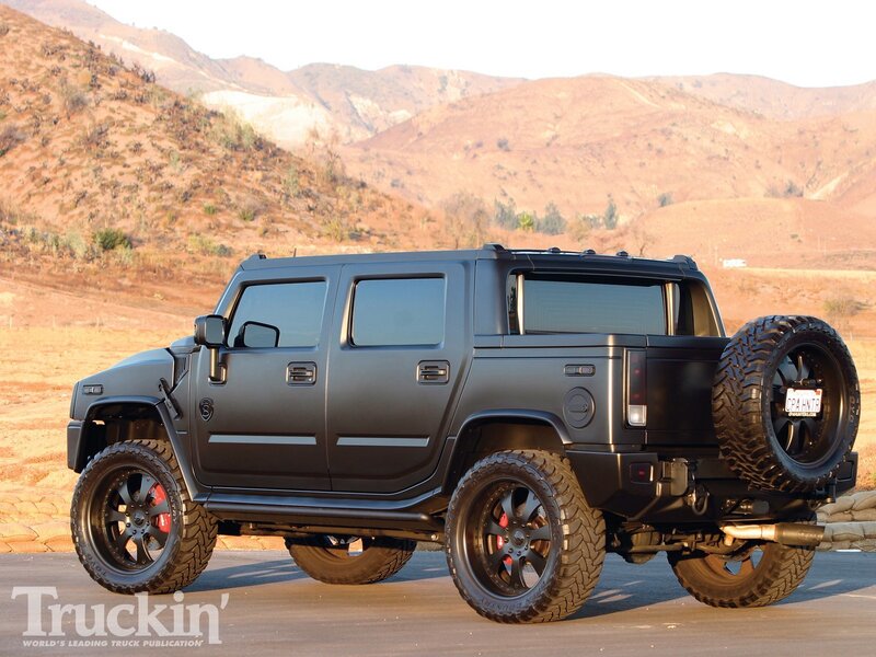 Black Hummer H2 SUV — Dramatic, Sunset