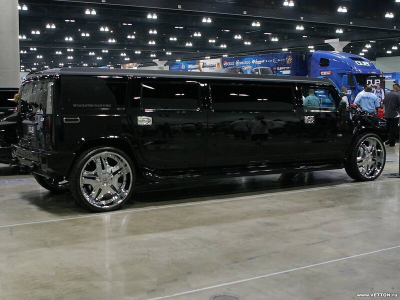 black hummer limo at show