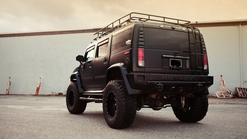 black hummer suv with roof rack