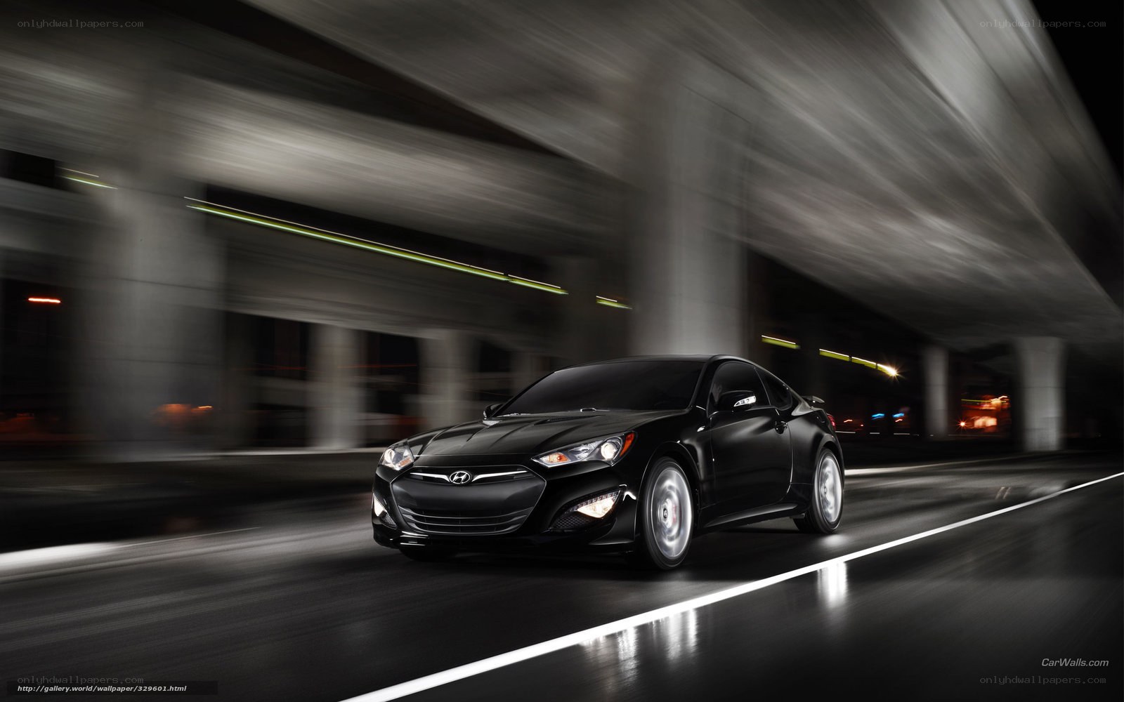 Black Hyundai Coupe in Motion