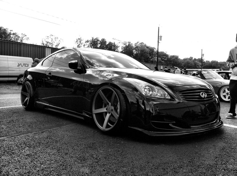black infiniti coupe at car show