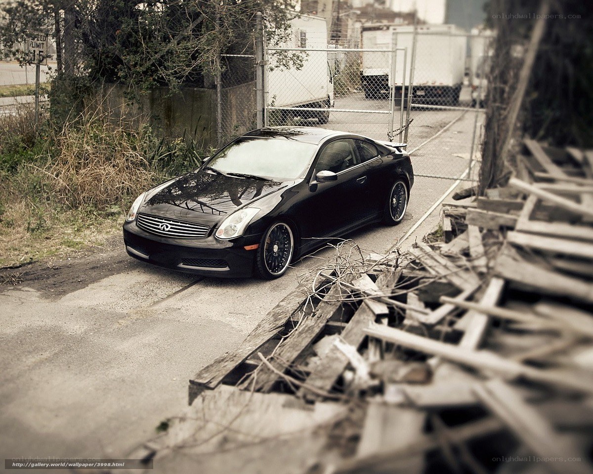 black infiniti coupe in alley