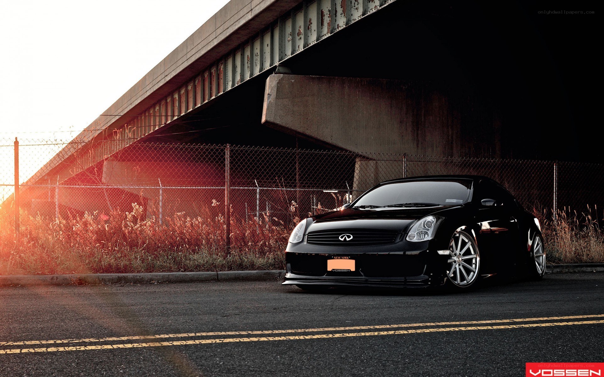 Black Infiniti G35 under a bridge