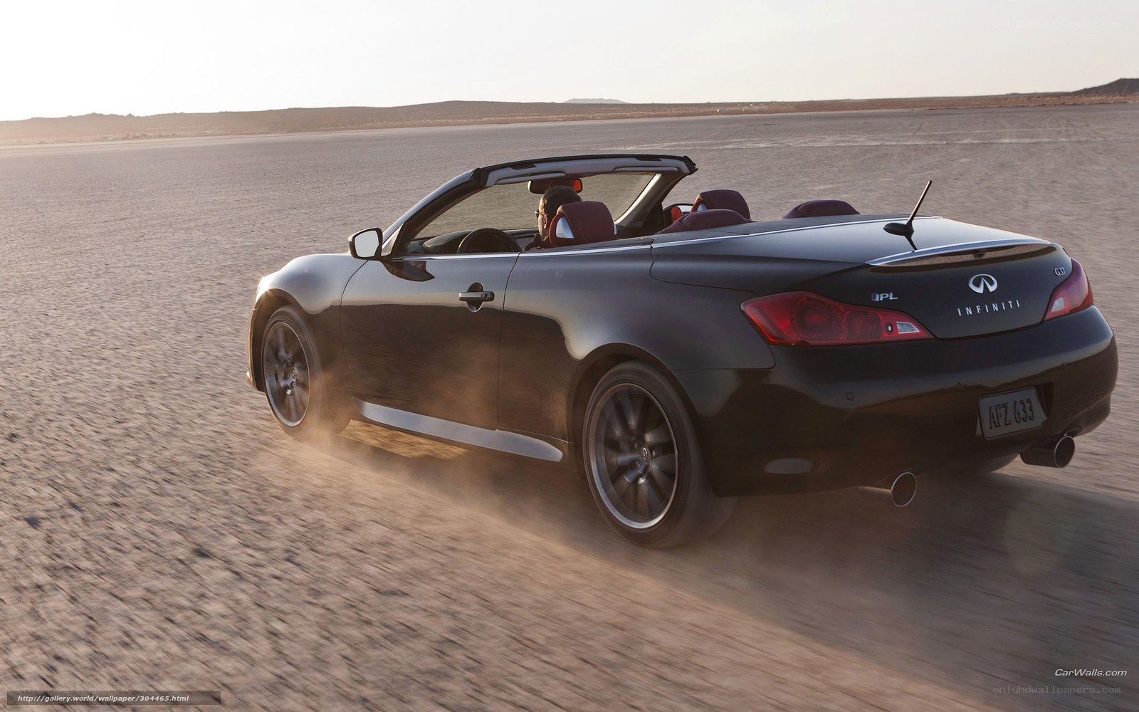 Black Infiniti G37 convertible driving