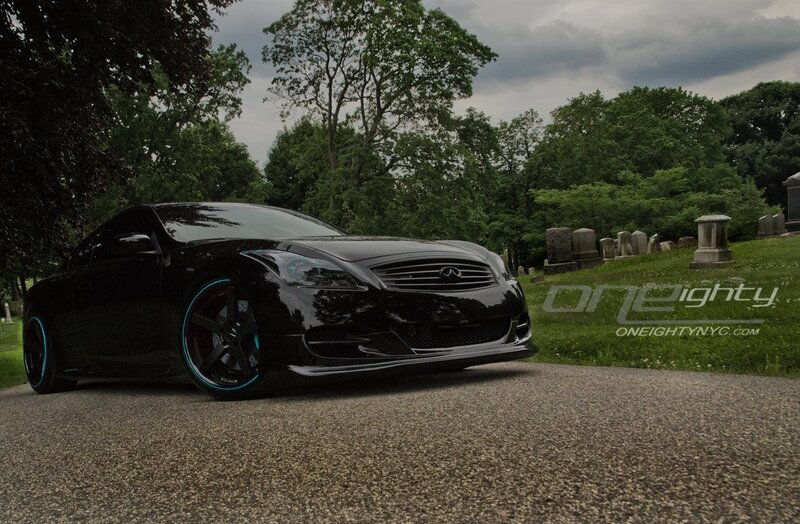 black infiniti in a cemetery