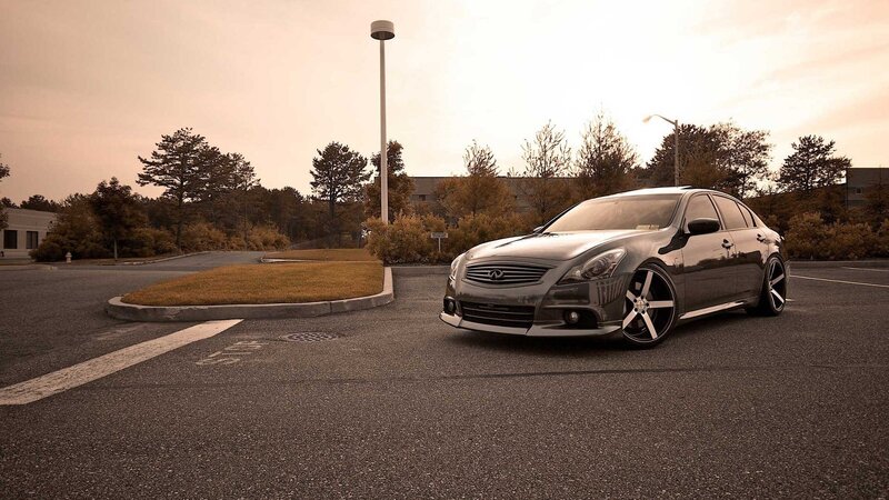 black infiniti in parking lot