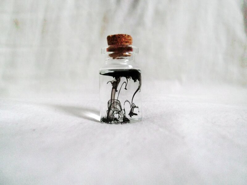 Black Ink in Glass Bottle