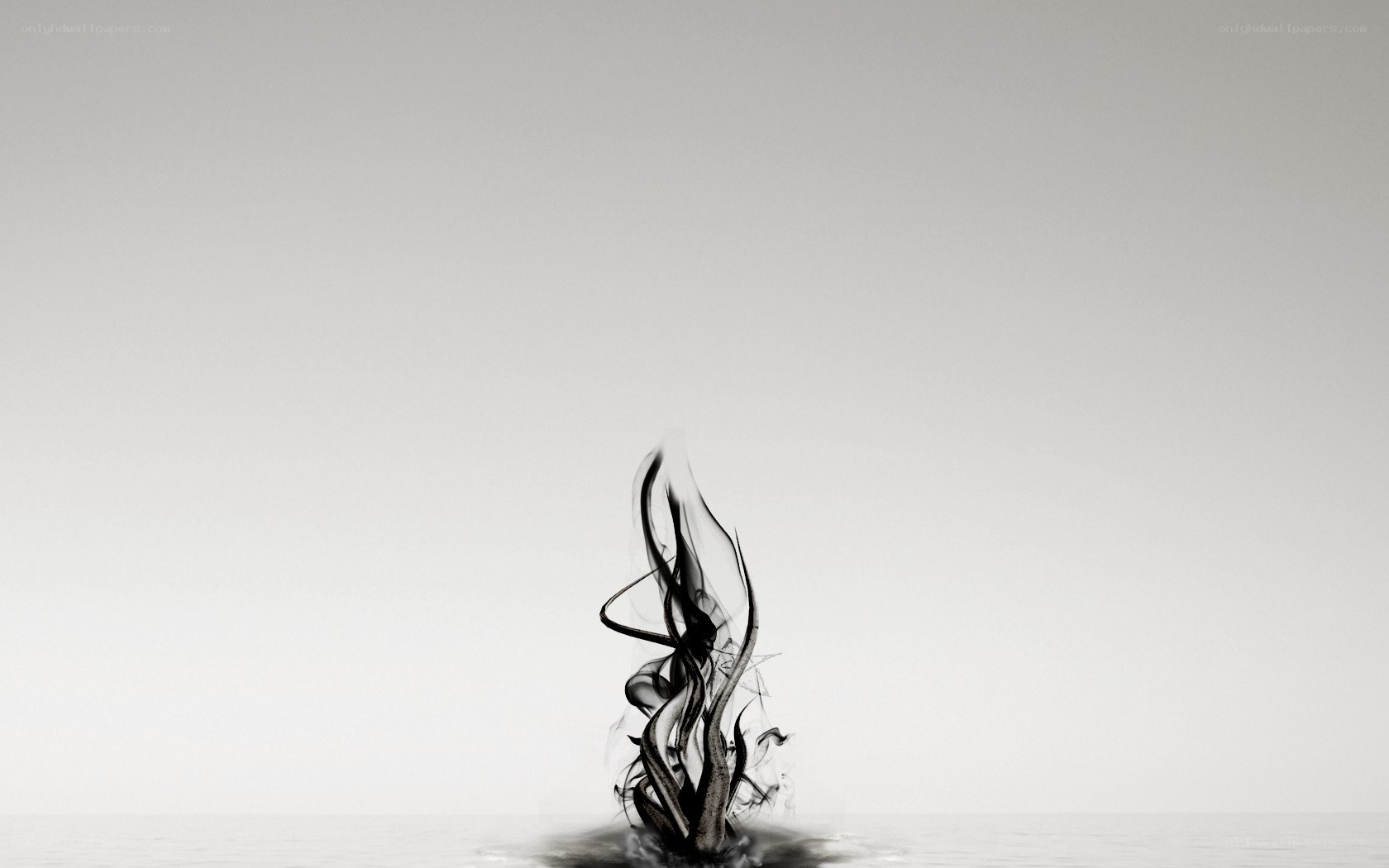black ink rising from water