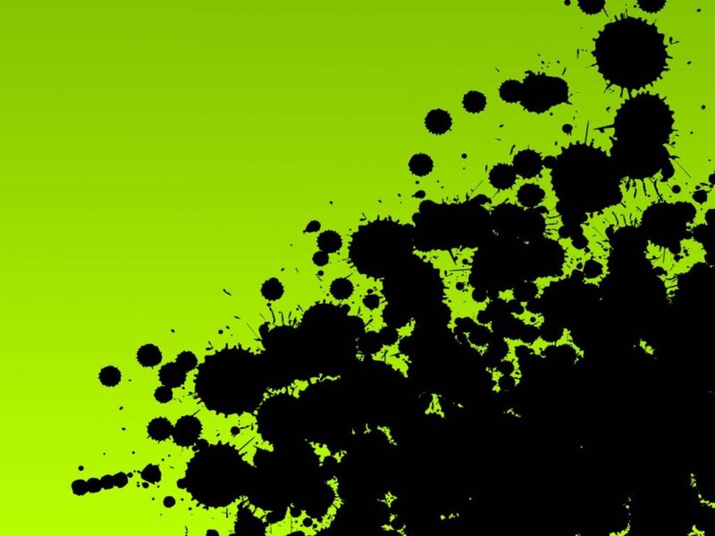 black ink splatters on green