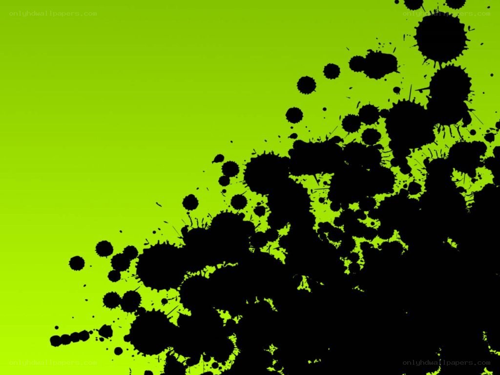 black ink splatters on green