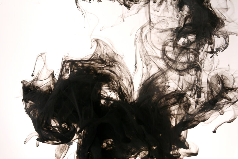 black ink swirling in water