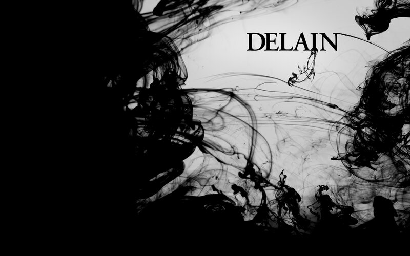 black ink swirls with text