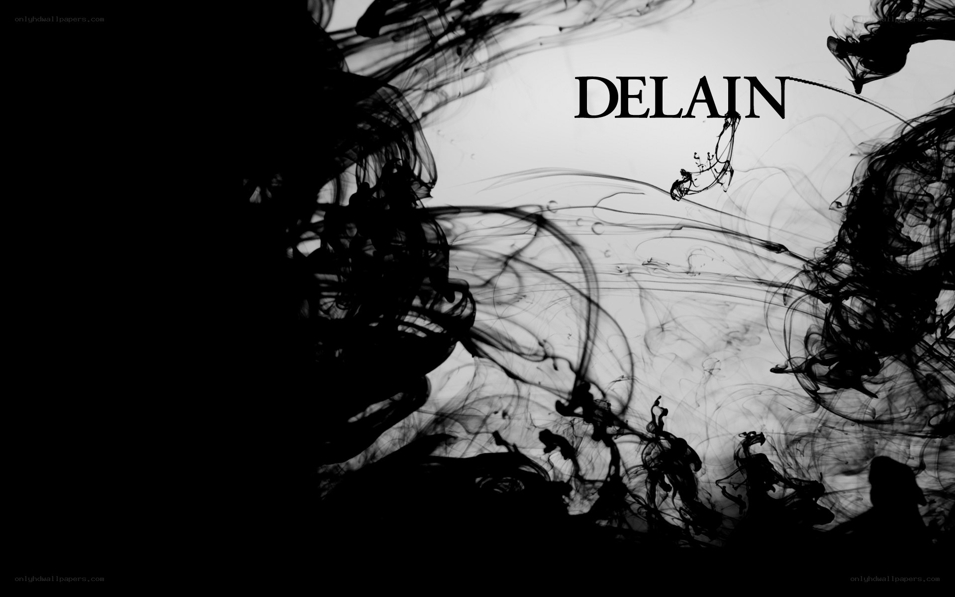 black ink swirls with text