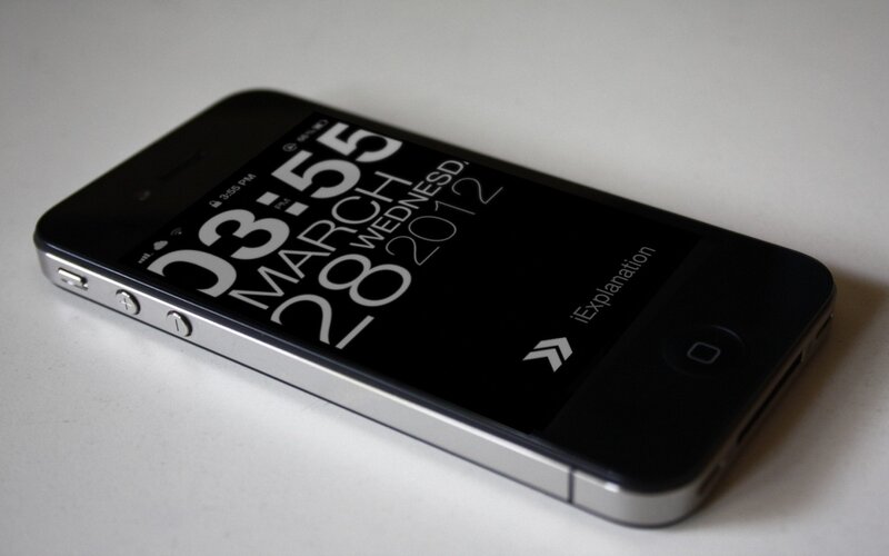 Black IPhone on White Surface