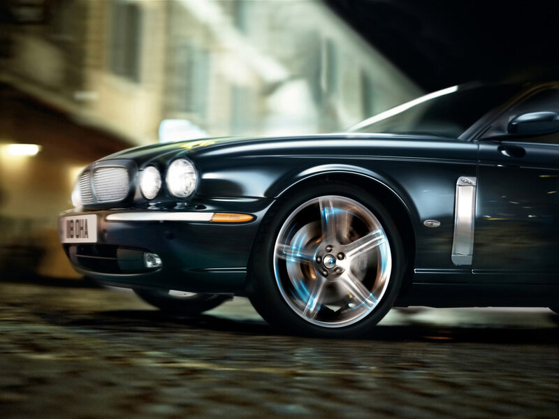 Black Jaguar car on city street