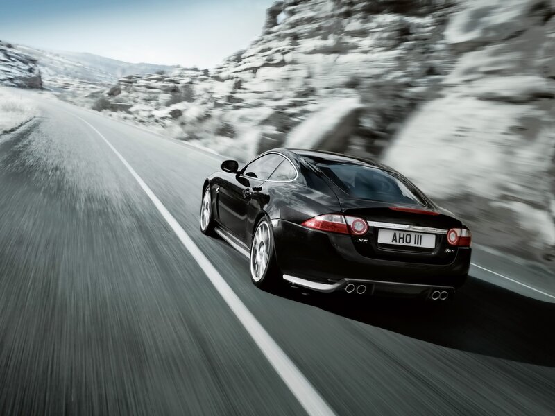 Black Jaguar Coupe — Dynamic, Winter, Photograph