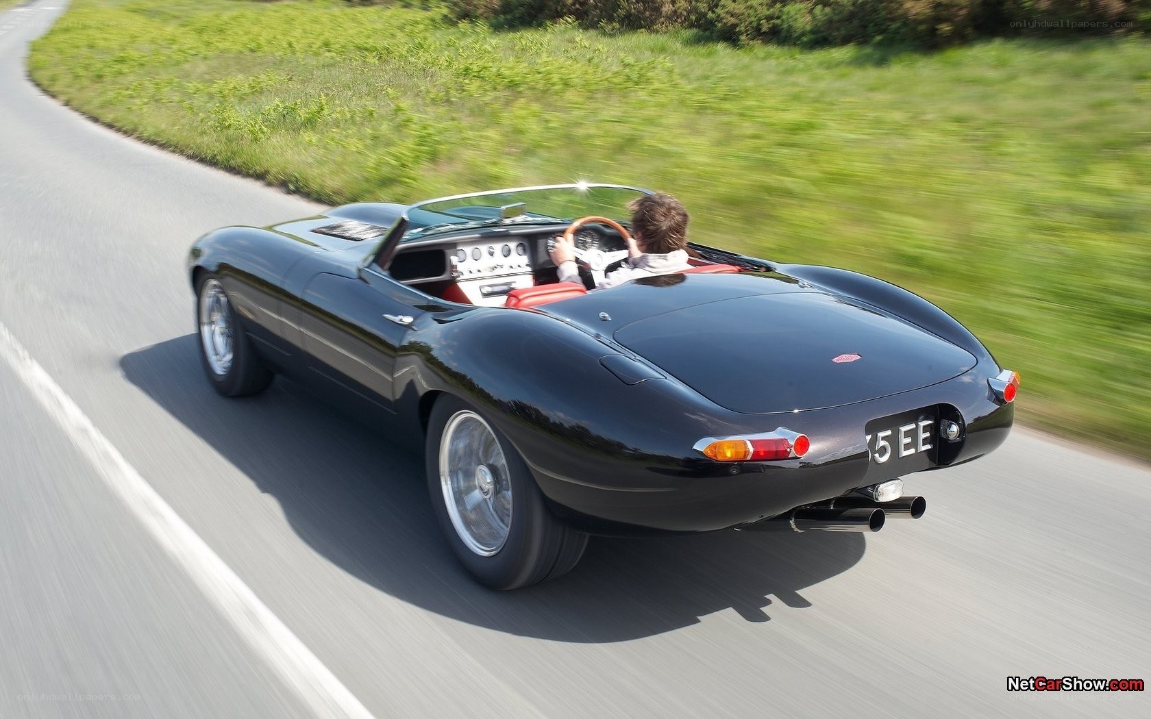 black jaguar e-type driving