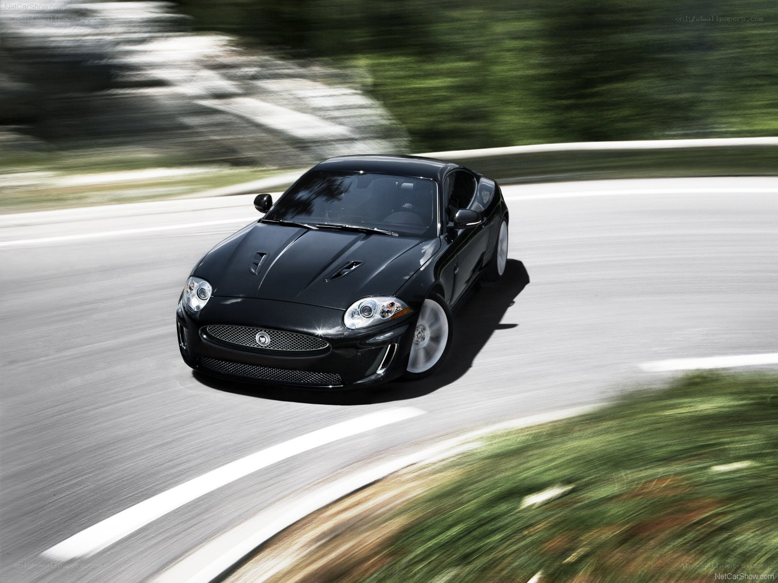 Black Jaguar F-Type in motion