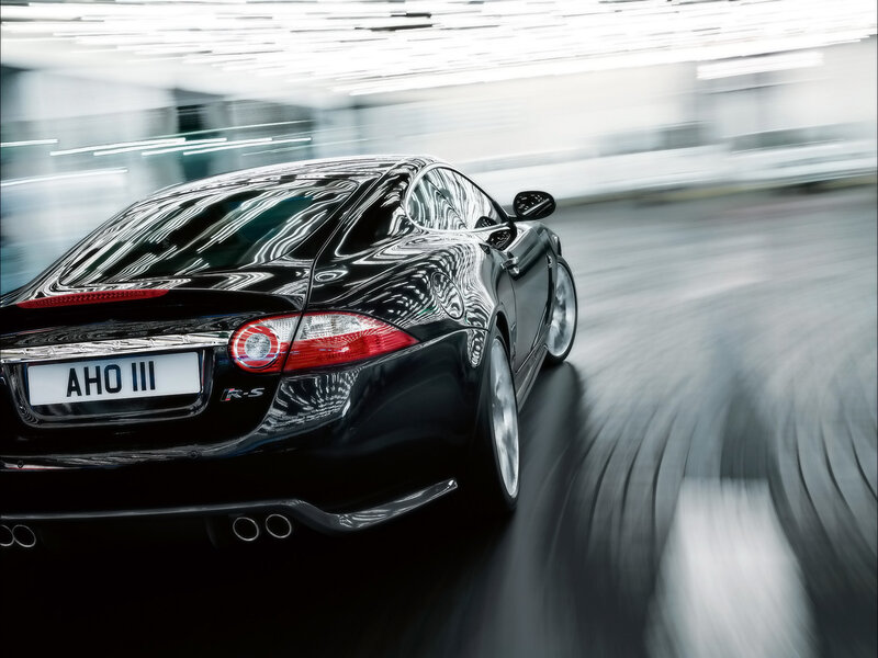 Black Jaguar R-S in motion