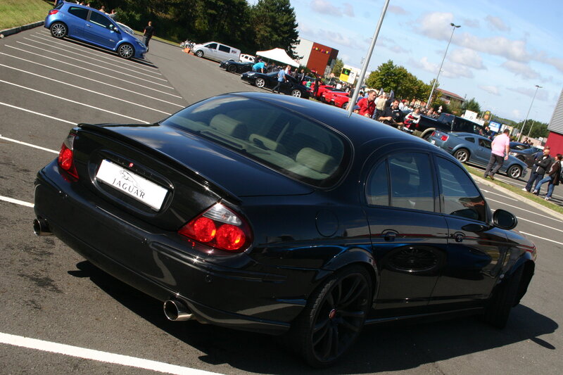 Black Jaguar Sedan — Outdoor