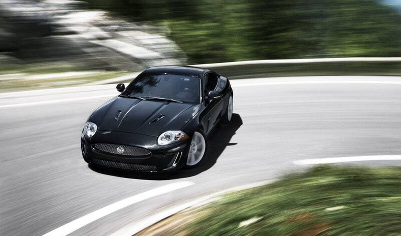 Black Jaguar Sports Car — Dynamic, Afternoon, Photograph, Road