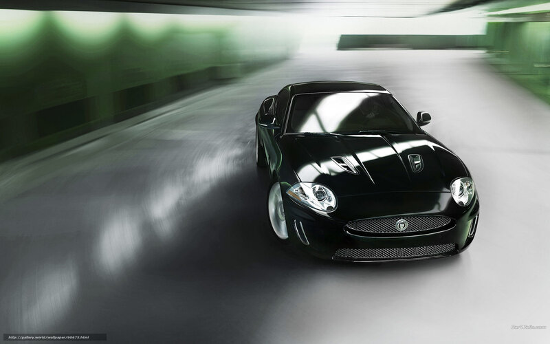 Black Jaguar sports car in motion