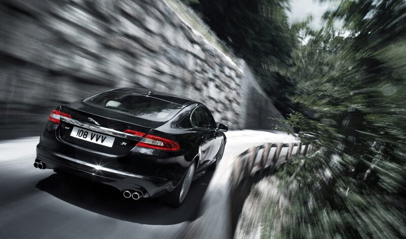 Black Jaguar XF in motion