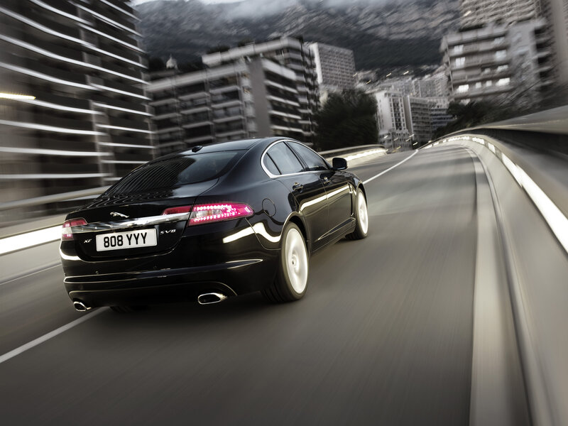 Black Jaguar XF in motion