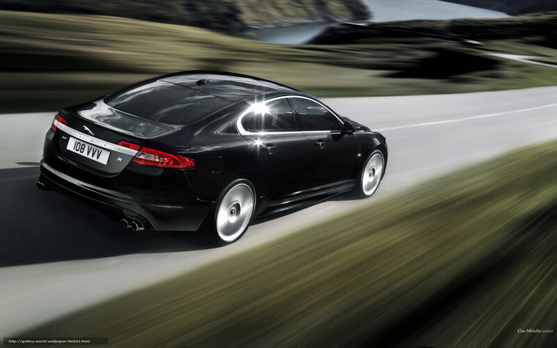 Black Jaguar XF in motion