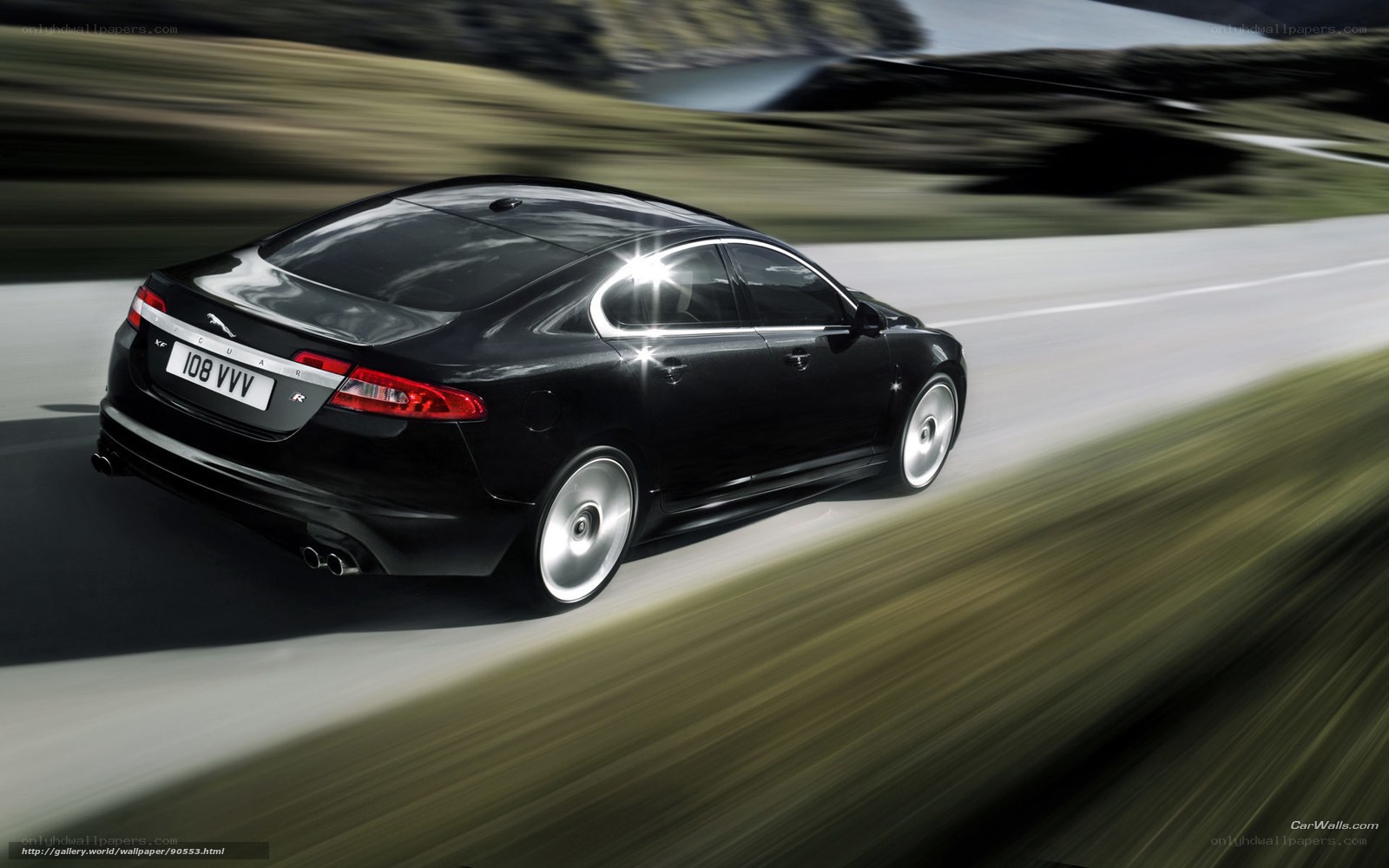 Black Jaguar XF in motion