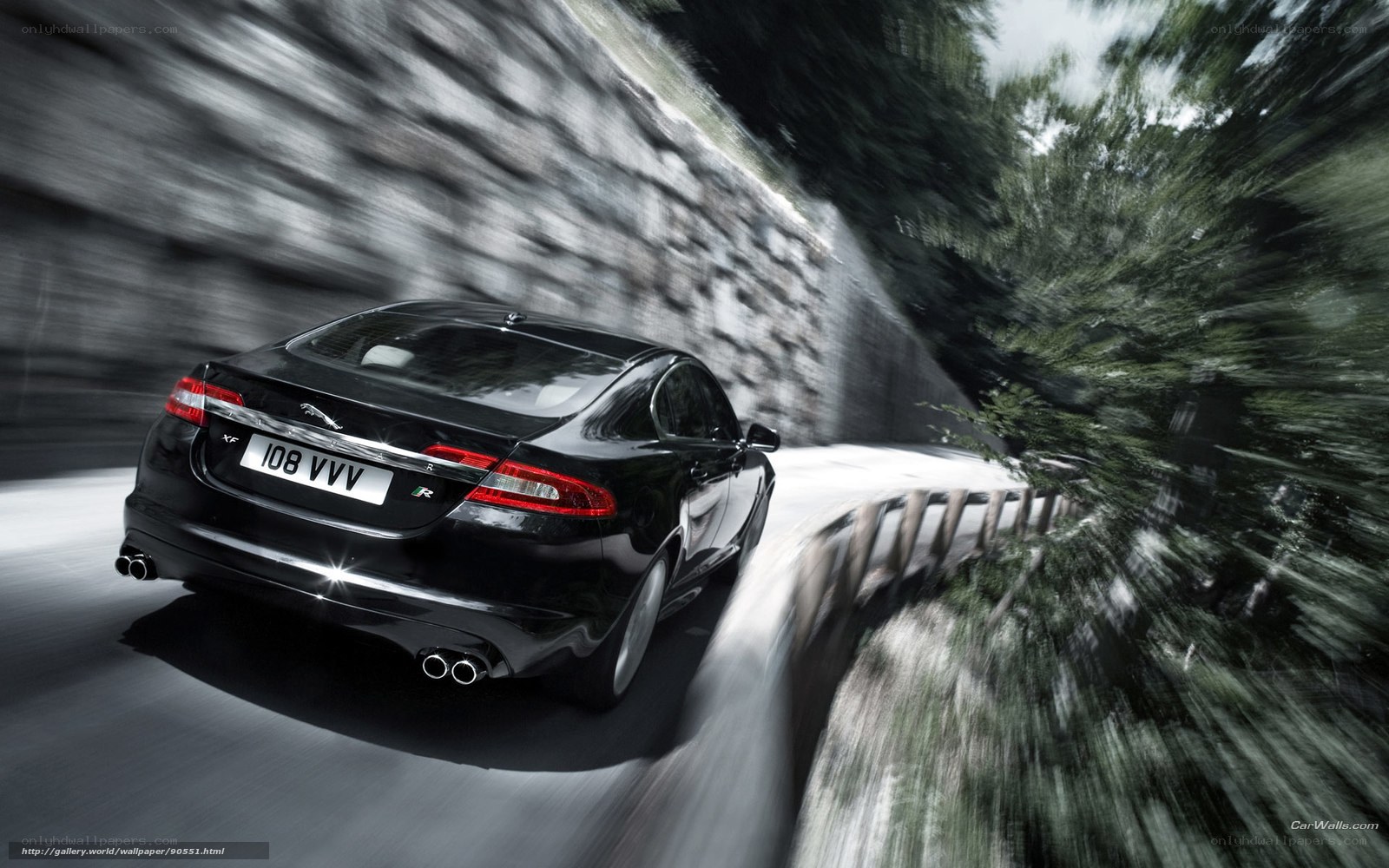 Black Jaguar XF R in motion