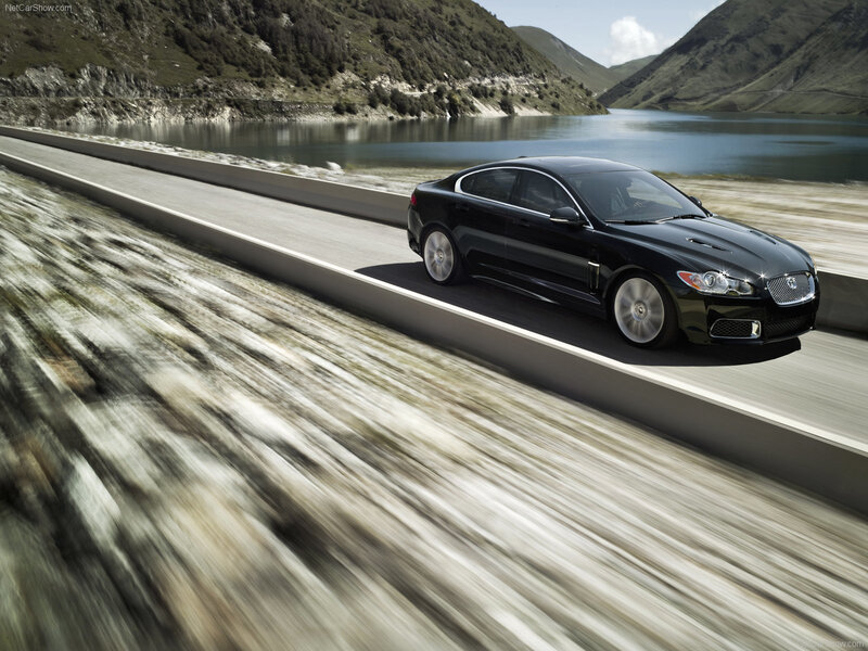 Black Jaguar XFR on a mountain road