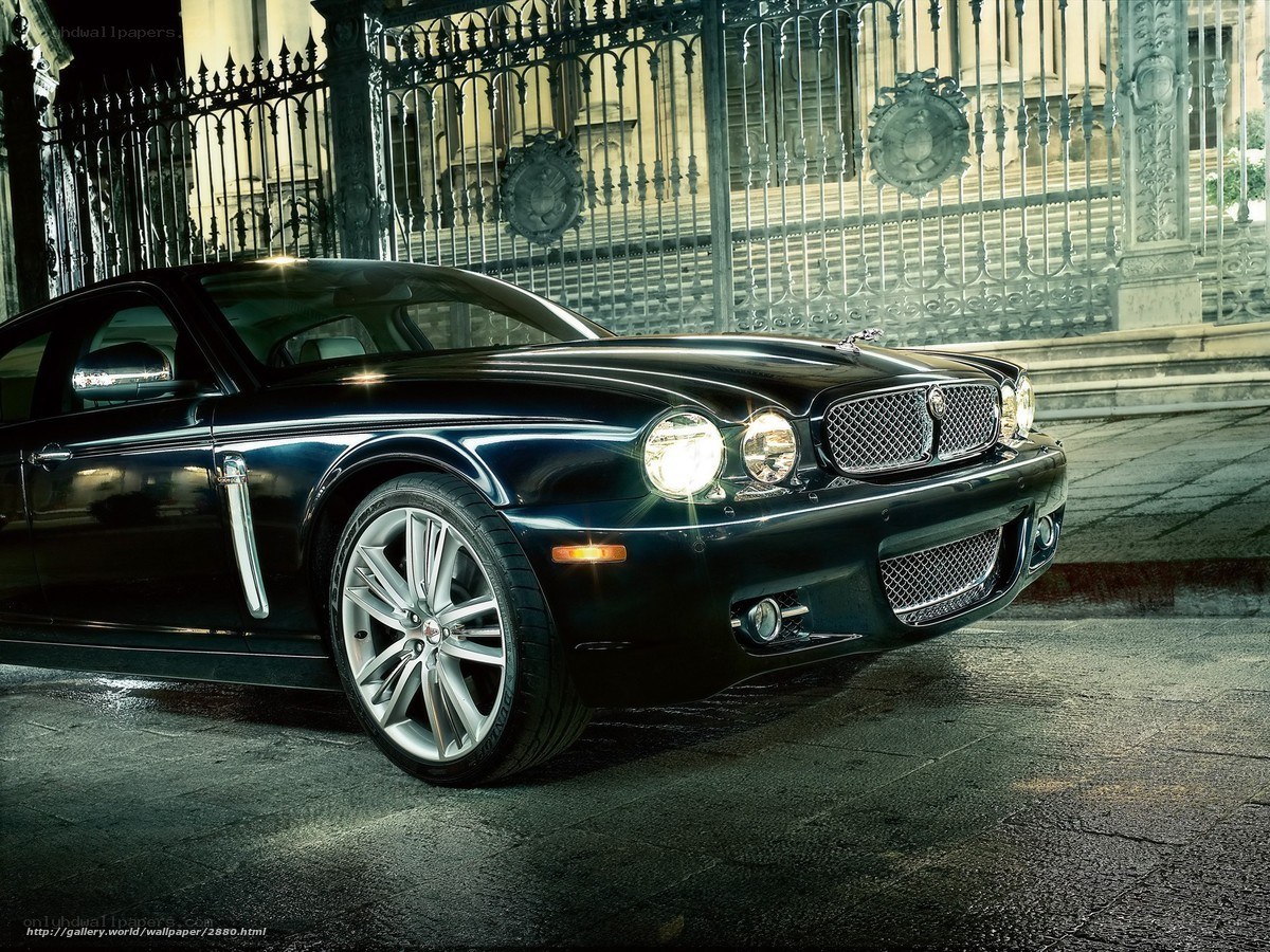 Black Jaguar XJ at night