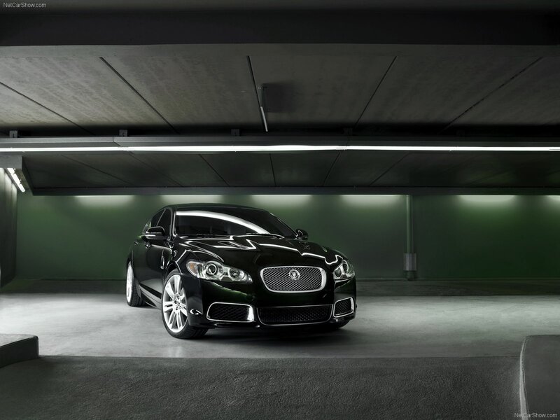 Black Jaguar XJ in a garage