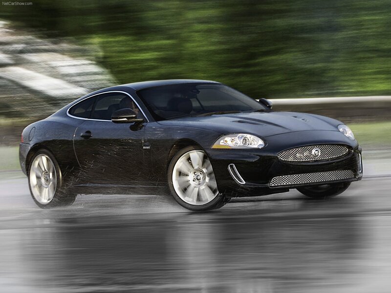 Black Jaguar XK in motion