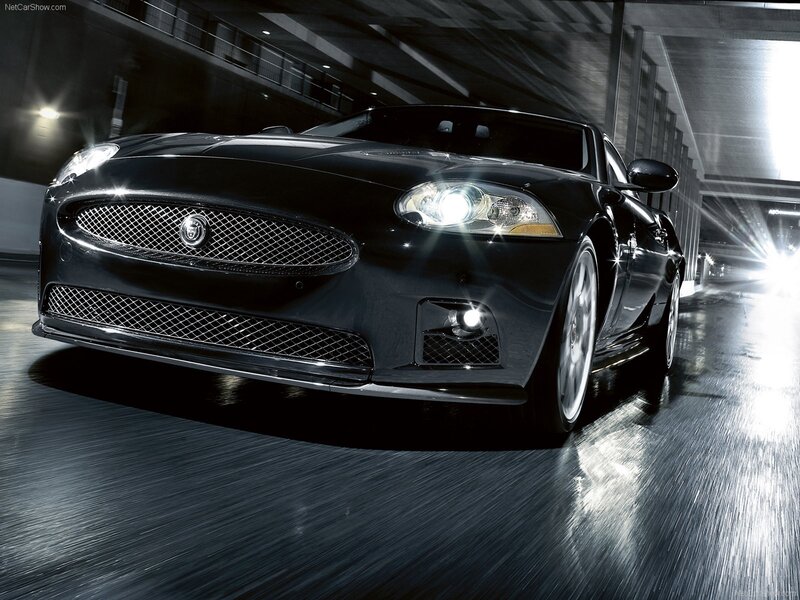 Black Jaguar XK in motion