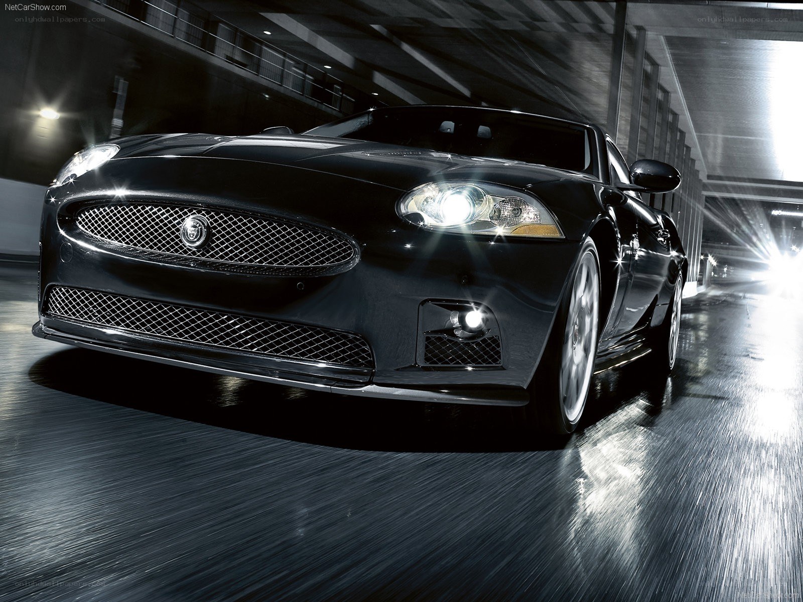 Black Jaguar XK in motion