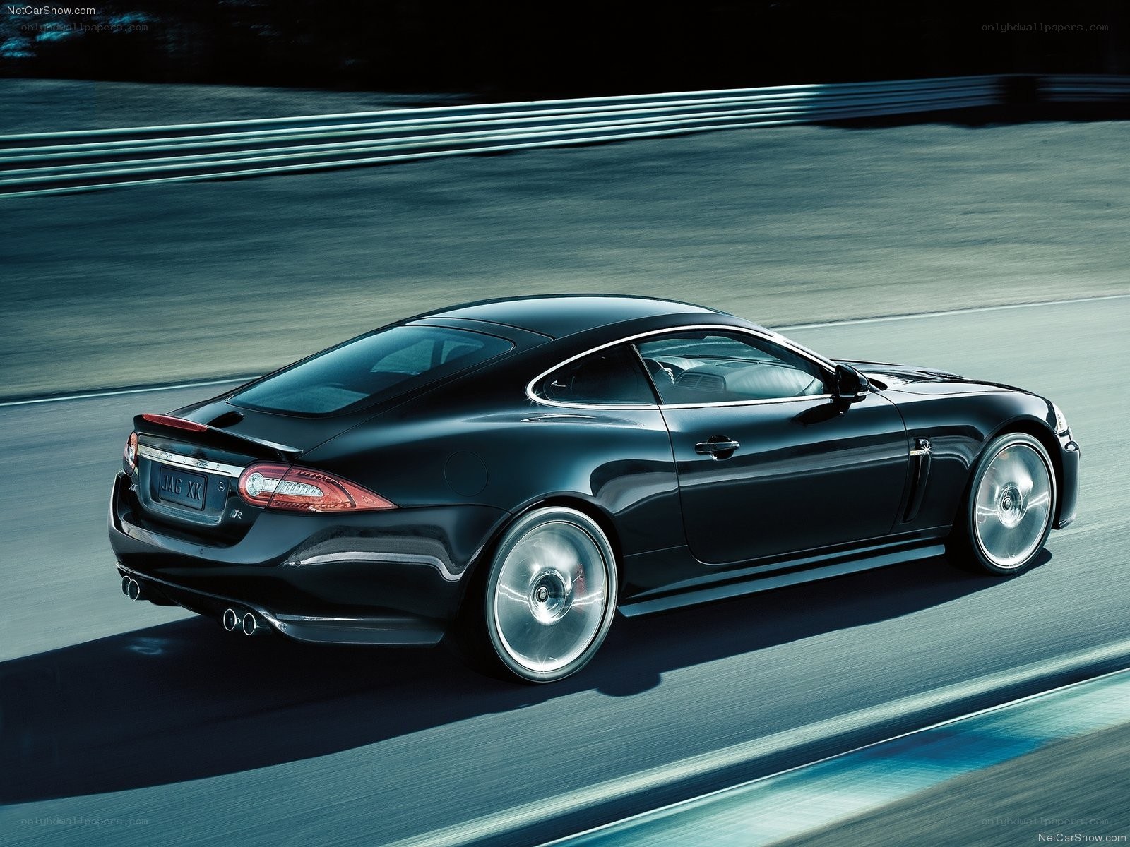 Black Jaguar XK in motion