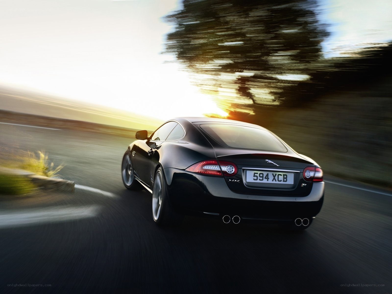 Black Jaguar XKR in motion
