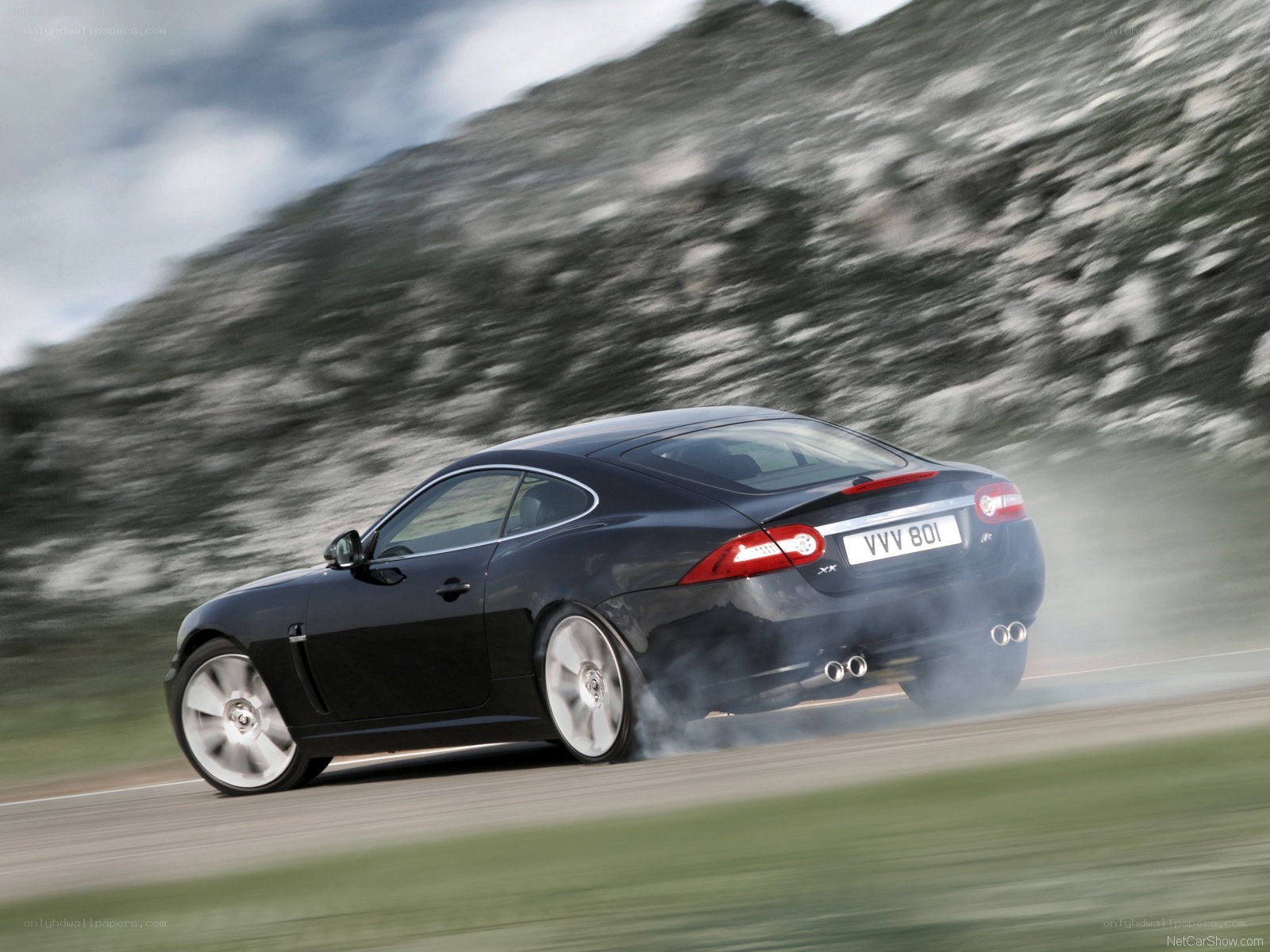 Black Jaguar XKR in motion