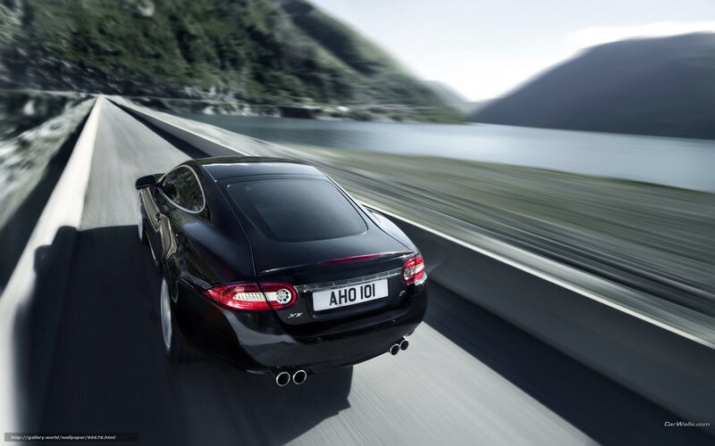 Black Jaguar XKR on a scenic road